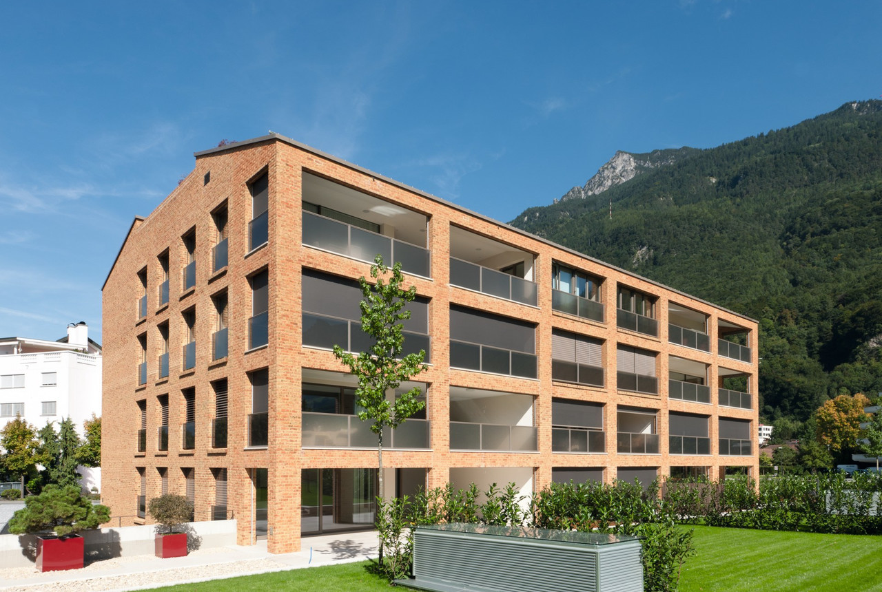 A multi-family house overlooking the Alps