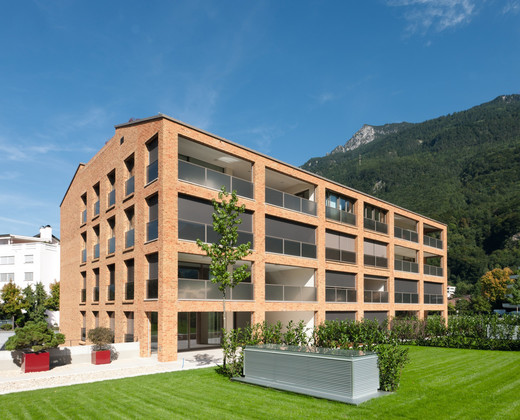 A multi-family house overlooking the Alps